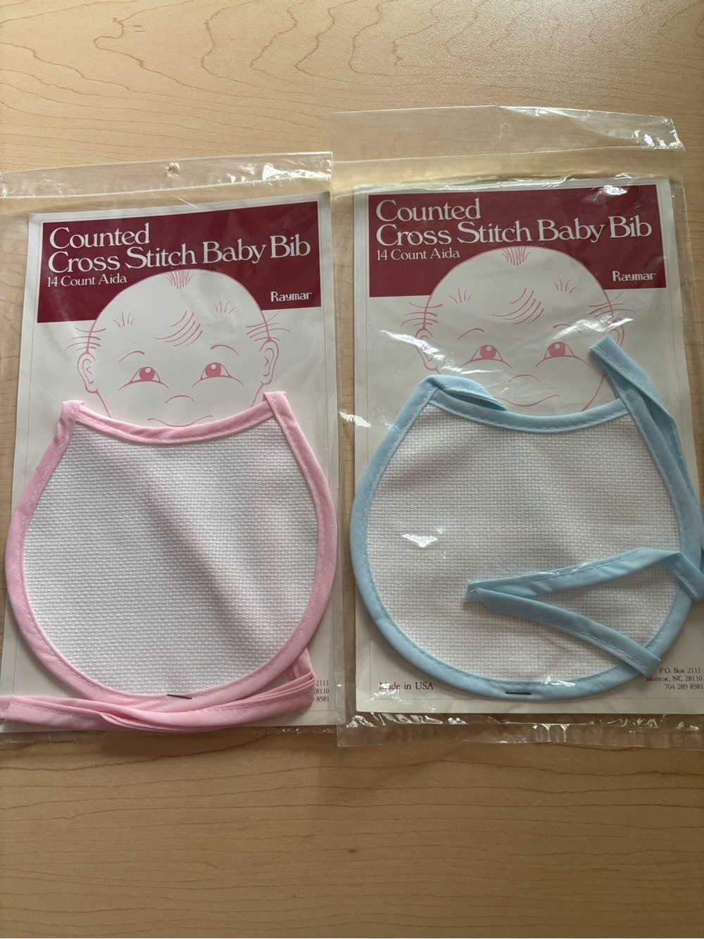 NWT 2 Baby’s Counted Cross Stitch Bibs
 Blue/Pink. To complete Birth/Shower GIFT